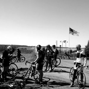 Riders lingering with bikes at the WTF gravel ride