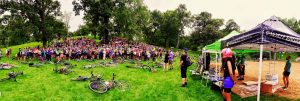 several hundred riders gathered on a hillside to start the race