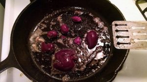 rabbit organs cooking in a pan