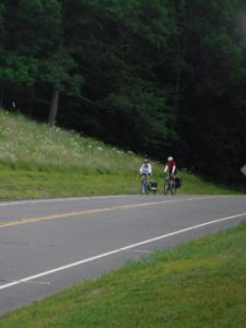riders biking down the road