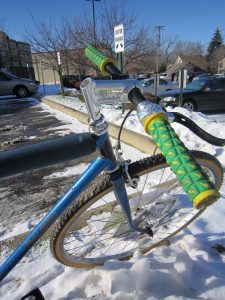 bike handlebars in a winter setting