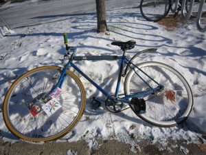 bike lying on a snowbank