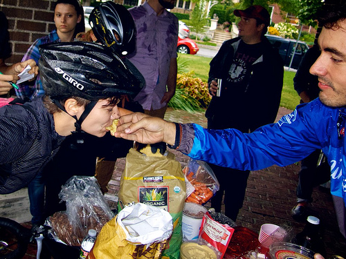 rider being fed a snack